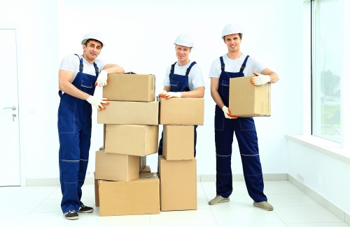 Removal team transporting furniture from a Knightsbridge property