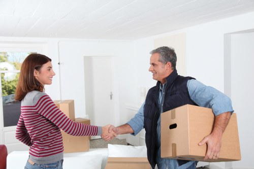 Van and mover handling apartment access in Knightsbridge