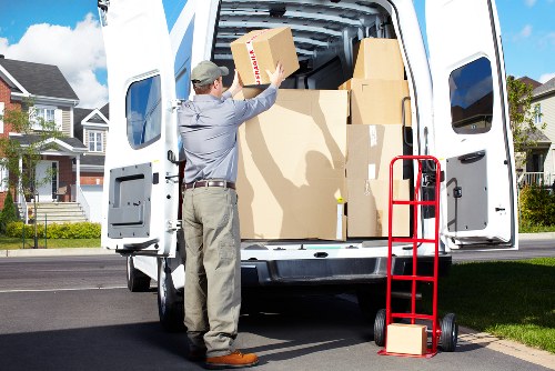 Packed boxes and furniture ready for removals in a Knightsbridge apartment